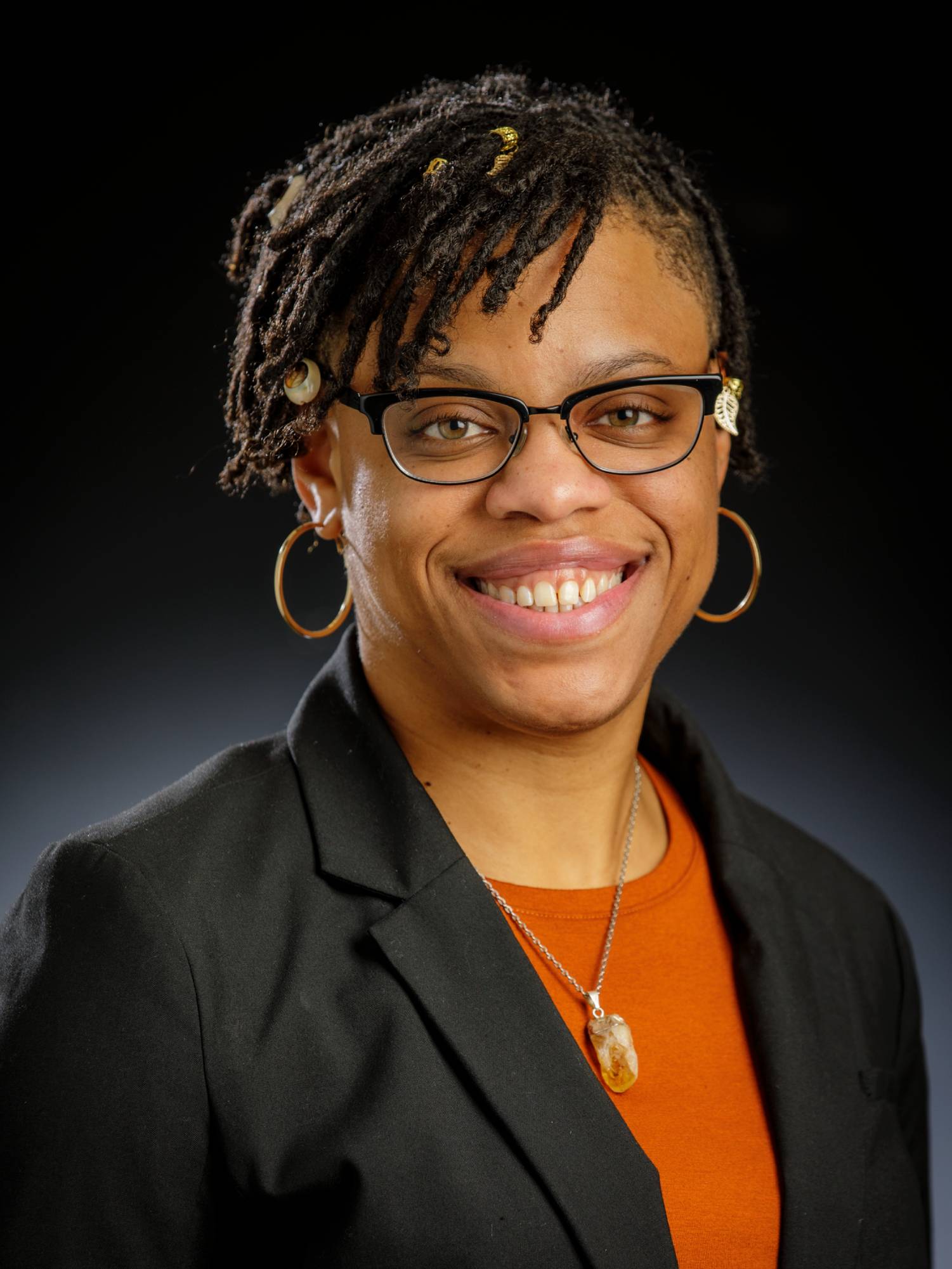 Headshot image of Nicole Stevenson, Staff member within the Division of Access and Community Impact